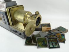 VICTORIAN BRASS & JAPANNED METAL MAGIC LANTERN with carry case and selection of glass lantern