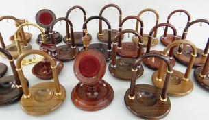 ASSORTED CARVED HARDWOOD WATCH STANDS WITH METAL MOUNTS including rosewood, ETC (approx. 23)