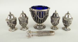 EDWARD VII SILVER FIVE-PIECE CONDIMENT SET comprising four pierced pepperettes with blue glass