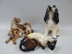 THREE LARGE CHINA FIGURINES OF ANIMALS including seated spaniel, tigers, Persian cat