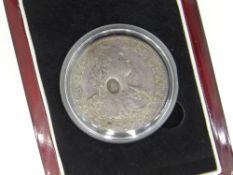 1797 SPANISH DOLLAR OF KING GEORGE III HAVING OVAL COUNTER STAMP OF HIS PORTRAIT, the coin itself