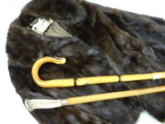 TWO WALKING CANES & A FUR STOLE (3)