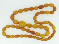 STRING OF GRADUATED BUTTERSCOTCH AMBER BEADS, 58cms long, 24.1gms