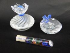 TWO SWAROVSKI SILVER CRYSTAL JEWELLERY BOXES, one flower, the other heart shaped, in original