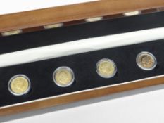 THE SHIELD DESIGN GOLD SOVEREIGN SET comprising all four types of British gold sovereign ever to