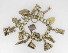 18CT GOLD CURB LINK CHARM BRACELET HAVING HEART SHAPED PADLOCK and an assortment of mainly 9ct
