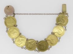 GOLD COIN BRACELET comprising 8 gold South African 1/2 pond 1897 coins, the clasp engraved '