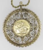 1877 GOLD SOVEREIGN SET IN 9CT GOLD SCROLL DESIGN MOUNT on yellow metal chain. Coin and setting