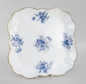NANTGARW PORCELAIN LOBED SQUARE DISH painted in blue with sprays of flowers and with gilt rim,