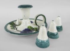 A LLANELLY POTTERY CHAMBERSTICK WITH THREE SNUFFERS of circular form with loop handle, painted