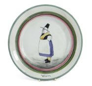 A LLANELLY PLATE SIGNED BY SHUFFLEBOTHAM of circular form with green and red trim, painted with a