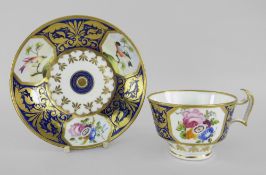 A SWANSEA PORCELAIN TEA CUP & SAUCER attributed to William Pollard, painted with birds on branches