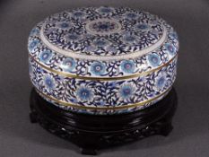 20TH CENTURY CLOISONNE ENAMEL CIRCULAR BOX & COVER on a carved hardwood stand decorated in blue