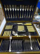 OAK CASED NEAR COMPLETE CANTEEN OF TABLE CUTLERY