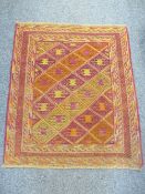 CAZAK RUG - muted pinks and greens with repeat pattern, central diamond block and multi-bordered