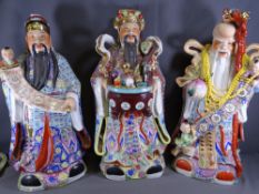 LARGE CHINESE FIGURES - men depicting various scenes, approximately 67cms H (3)