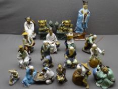 CHINESE SHIWAN POTTERY FIGURINES, a collection, along with a pair of gilt highlighted temple lion