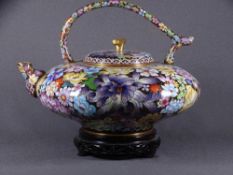 LARGE CLOISONNE ENAMEL TEA KETTLE on hardwood stand, 20th century profusely decorated in multi-
