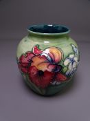 MOORCROFT ORCHID & SPRING FLOWERS VASE, 13cms H, impressed 'Moorcroft made in England' with Walter