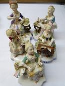 FIVE CONTINENTAL PORCELAIN SEATED LADY FIGURINES