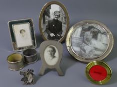THREE HALLMARKED & STERLING SILVER PHOTOGRAPH FRAMES along with three others, a silver napkin ring