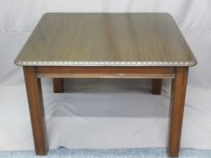 RECTANGULAR MAHOGANY DINING TABLE, pull-out extending action (no additional leaves) with carved edge
