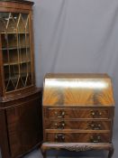 FIGURED MAHOGANY FALL-FRONT BUREAU and a reproduction glass top corner cabinet, 98cms H, 79cms max