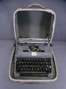 VINTAGE TYPEWRITER - cased Olympia Deluxe