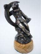 VINTAGE CAR ACCESORY MASCOT-PIERROT SEATED IN A CRESCENT MOON French, circa 1920, stamped MADY, 12.