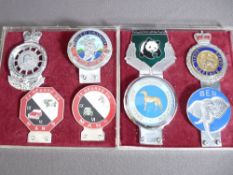 VINTAGE CAR BADGES X 8 to include Morgan 24 Heures Du Mans x 2, Civil Defence Corps, St