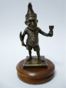 VINTAGE CAR MASCOT-MR PUNCH standing figure holding a goblet,13.25cms H, unmarked.