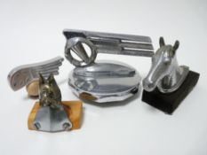 VINTAGE CAR BRAND EMBLEM MASCOTS- to include, TRIUMPH RENOWN winged torch, 6.5cms H, 13cms L, SINGER