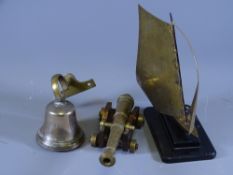 BRASSWARE, MODEL OF A CANNON, A YACHT AND A SHIP'S BELL
