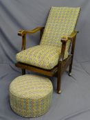 AN ADJUSTABLE RETRO STYLE WOODEN ARMED CHAIR with pouffe stool.