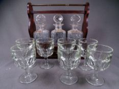 TANTALUS. Of 3 square hobnail cut decanters each with Gin, Whisky and Brandy collars and 6 heavy
