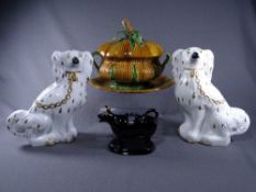 PAIR OF WHITE SEATED STAFFS DOGS, a black Jackfield cow creamer and a large oval 'corn on the cob'