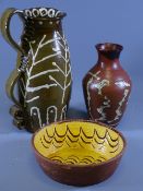 A LARGE SLIPWARE JUG WITH DOUBLE HANDLES 31cms high, a similar bowl and a studio pottery vase