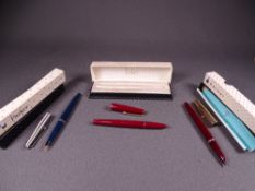 PARKER - Two vintage Parker fountain pens - 1. 1960s red Parker 17 fountain pen with gold trim and