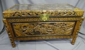 ORIENTAL CAMPHORWOOD BLANKET CHEST, heavily carved all round and with interior sliding tray and