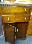 POLISHED RAILBACK CHEST of two drawers with two lower cupboard doors with chrome handles