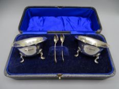 SILVER SALTS, A PAIR, cauldron shaped on 3 pad feet, with pair of spoons, 2 ounces Chester 1922.
