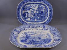 BLUE AND WHITE TURKEY PLATTER-3 figures and dog by a tree with distant church and cottage, 50x38 cms