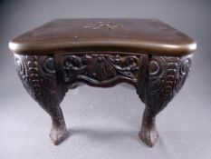 FOOTMAN IN BRONZE EFFECT with scrolled and patterned front