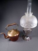 GEORGIAN COPPER KETTLE with acorn knob and a chrome based oil lamp with patterned semi opaque shade