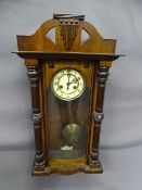 A VIENNA WALL CLOCK-neat mahogany cased with brass pendulum and movement initialled CB. 87 cms high