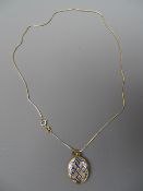 14 CARAT GOLD FINE CHAIN with enamelled yellow metal Locket 4g (chain)
