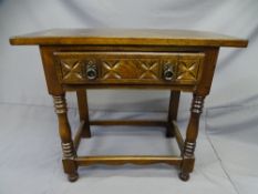 RUSTIC SIDE /HALL TABLE, oblong with single drawer on turned and block supports