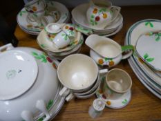 BARKER BROS- a parcel of fruit painted pottery dinner and breakfast ware