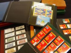 FIVE ALBUMS CONTAINING BOOKS OF FIRST & SECOND CLASS ROYAL MAIL STAMPS comprehensively filled,