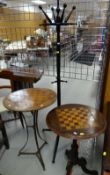 ANTIQUE MAHOGANY CIRCULAR GAMES TABLE, a circular top games table with metal tripod stand and a